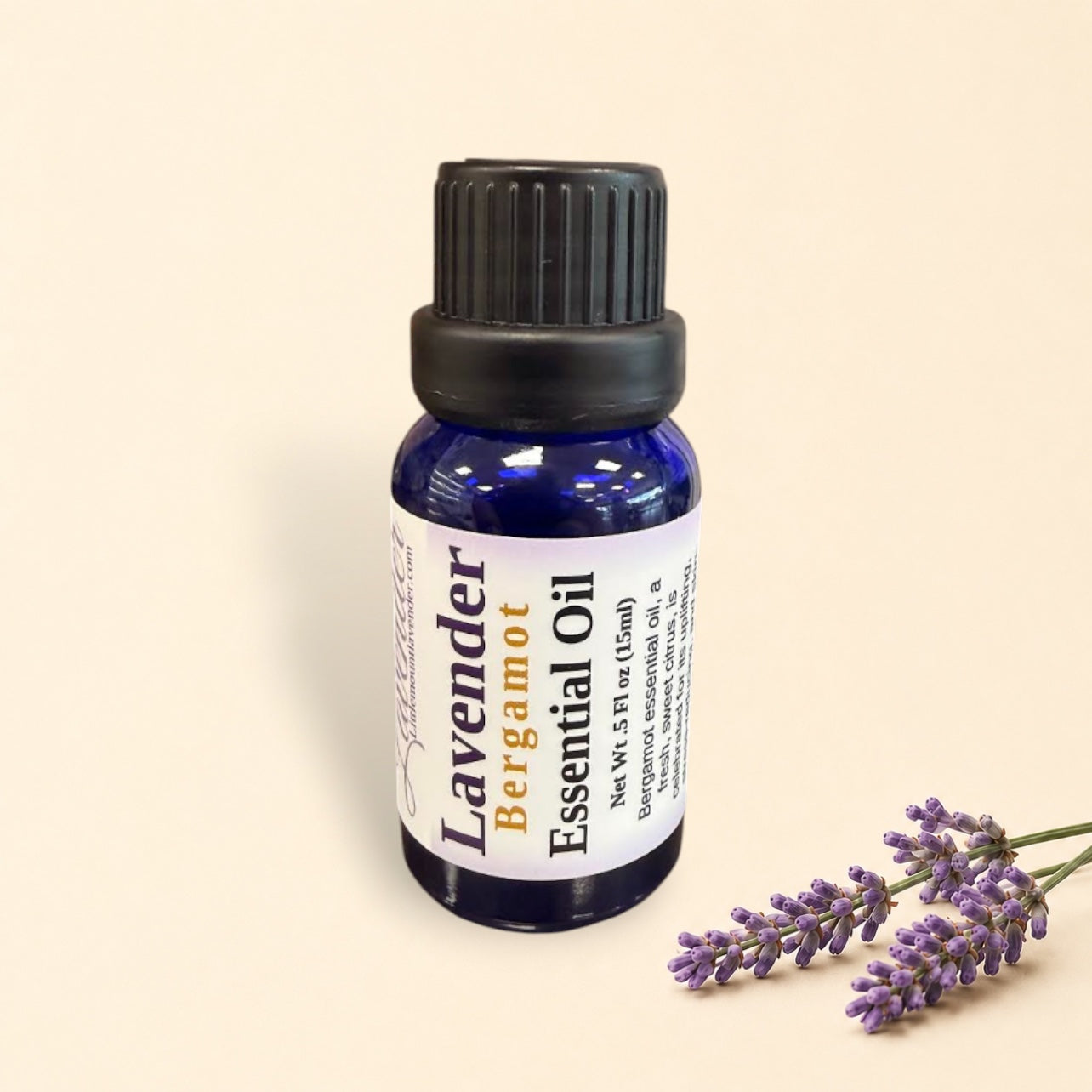 Little Mount Lavender essential oil blend of lavender and bergamot in a 15ml blue glass dropper bottle.
