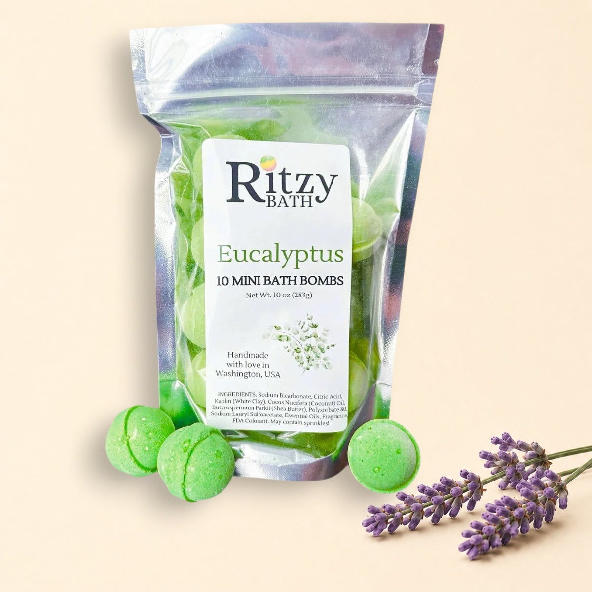 Little Mount Lavender Ritzy BATH eucalyptus mini bath bombs in a clear pouch with three green spheres in front.