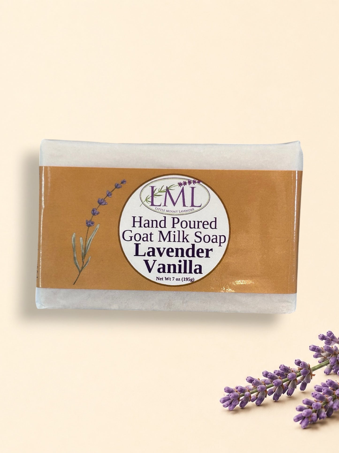 Little Mount Lavender handcrafted goat milk soap bar with lavender and vanilla scent, displayed with dried lavender.