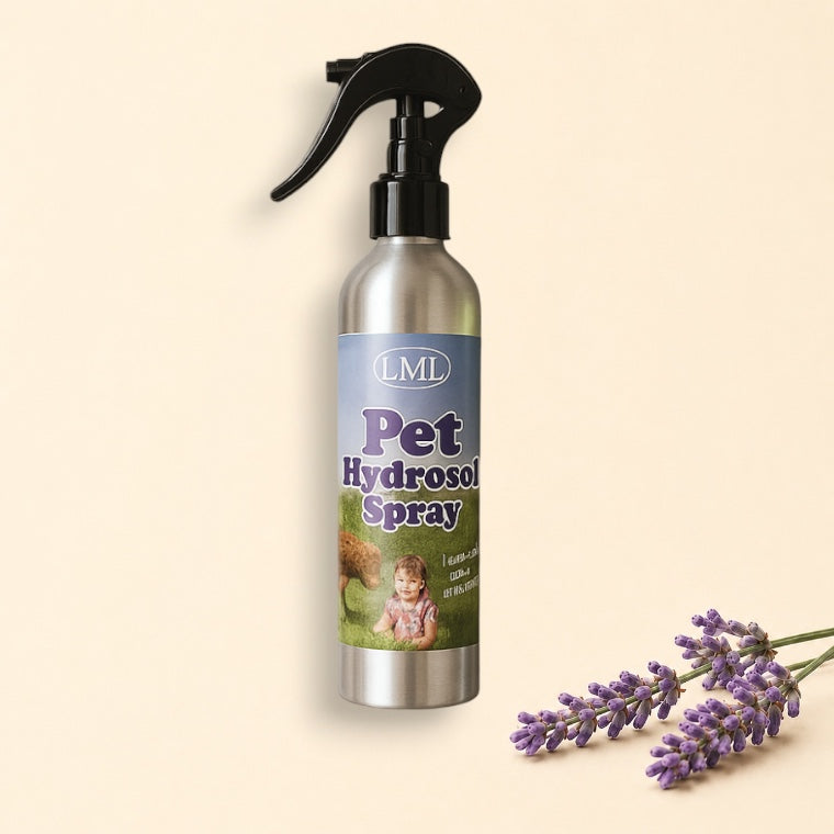 Pet hydrocol spray bottle with leash and tennis ball on a light background, featuring Little Mount Lavender branding.
