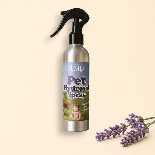 Pet hydrocol spray bottle with leash and tennis ball on a light background, featuring Little Mount Lavender branding.