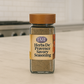 Jar of Herbs De Pravence Savory Seasoning on a kitchen counter