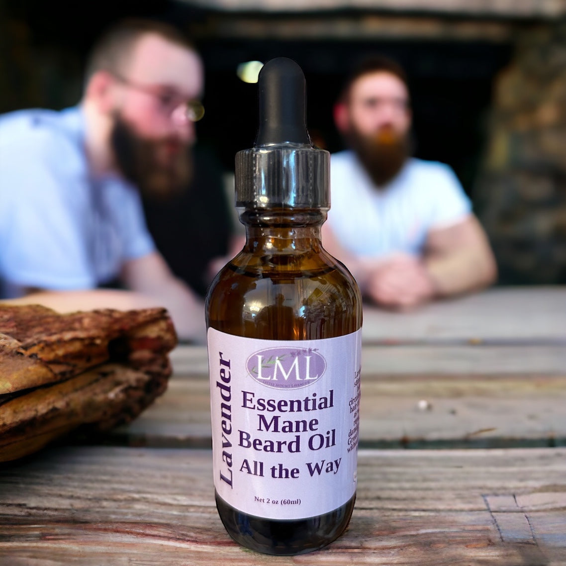 Little Mount Lavender beard oil bottle with dropper, featuring argan and jojoba oils, with two bearded men in background