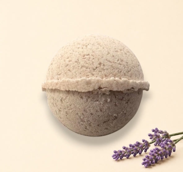 Little Mount Lavender handcrafted beige bath bomb with a textured surface for a luxurious spa experience.