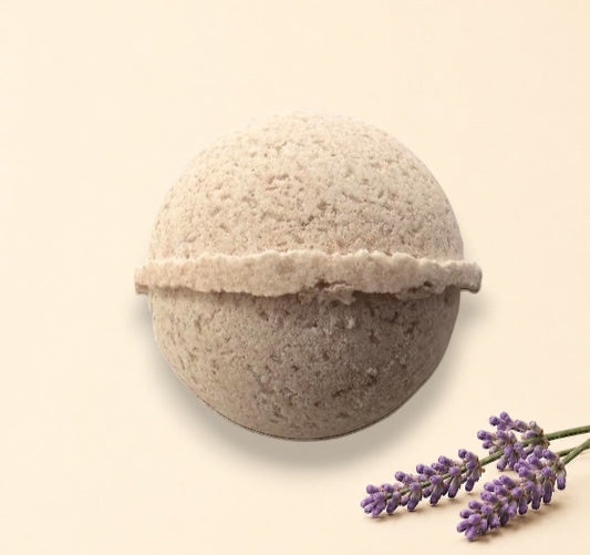 Little Mount Lavender handcrafted beige bath bomb with a textured surface for a luxurious spa experience.