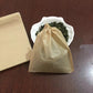 Little Mount Lavender biodegradable non-bleached paper tea bags with drawstring closure for loose leaf herbal tea.