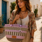 Little Mount Lavender boho straw tote bag with purple and brown stripes, fringe trim, and wooden bead accents.