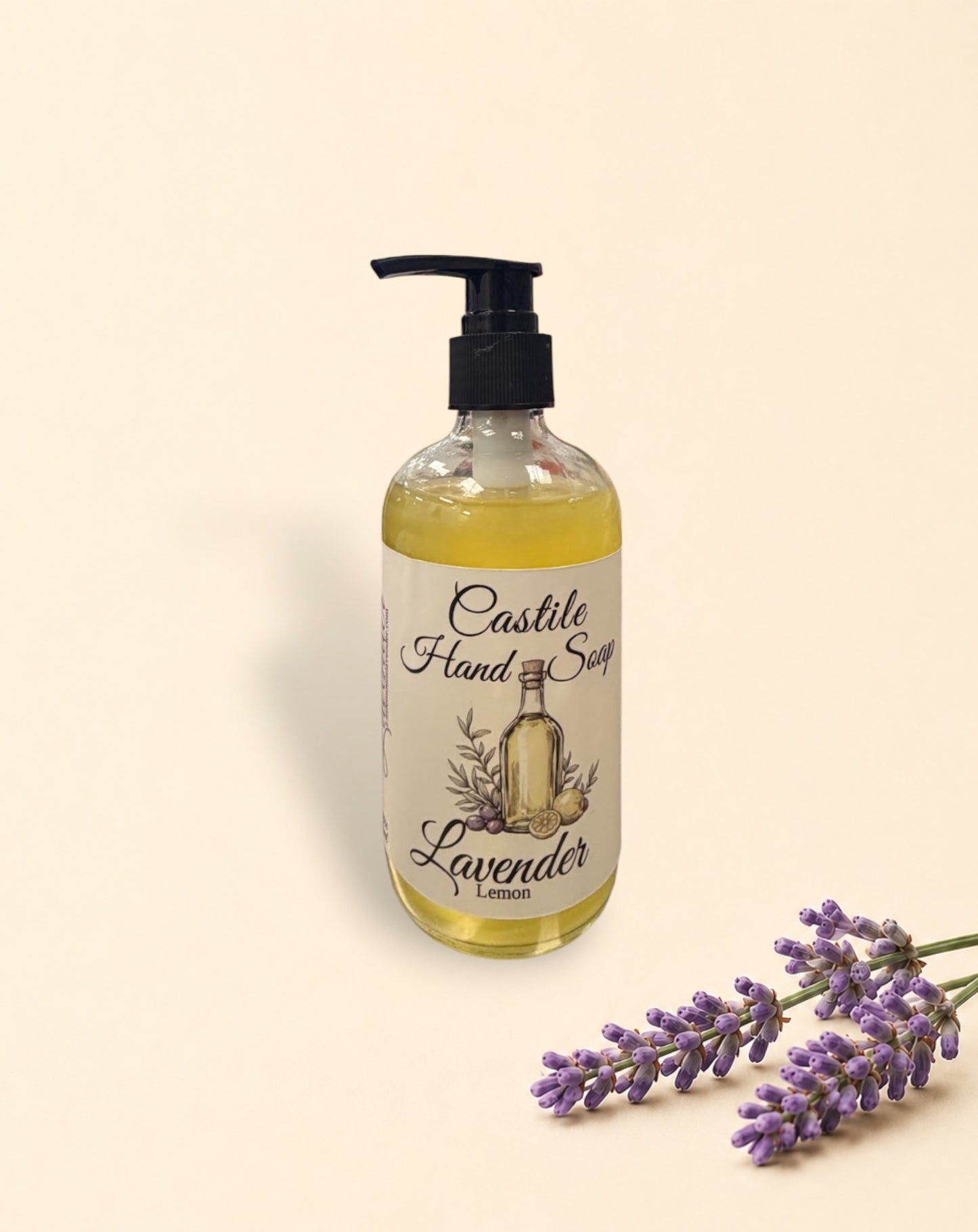 Little Mount Lavender castile hand soap bottles with pump dispensers and fresh lavender sprigs on a neutral background