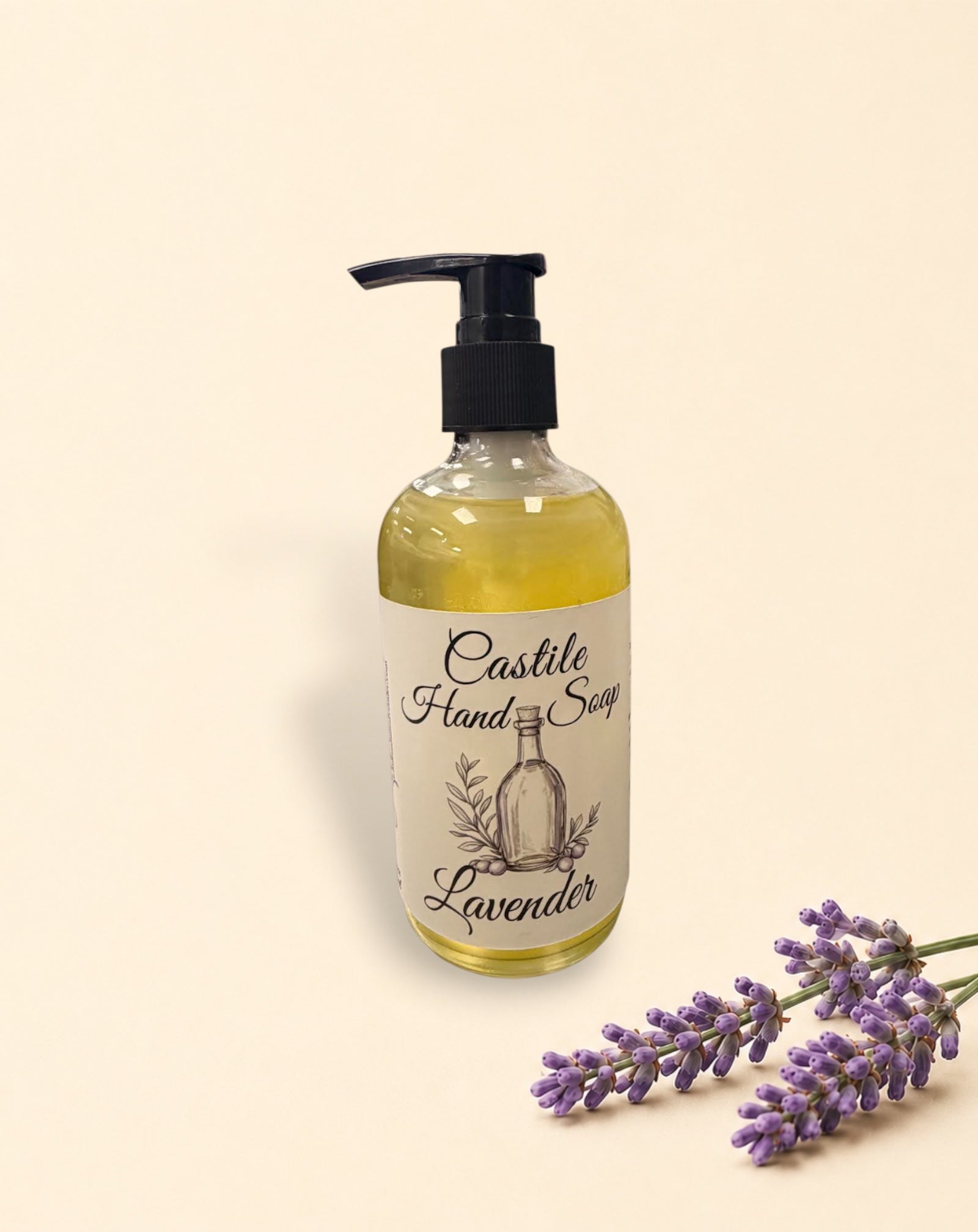 Two Little Mount Lavender castile hand soap bottles with pump dispensers and fresh lavender sprigs on beige background
