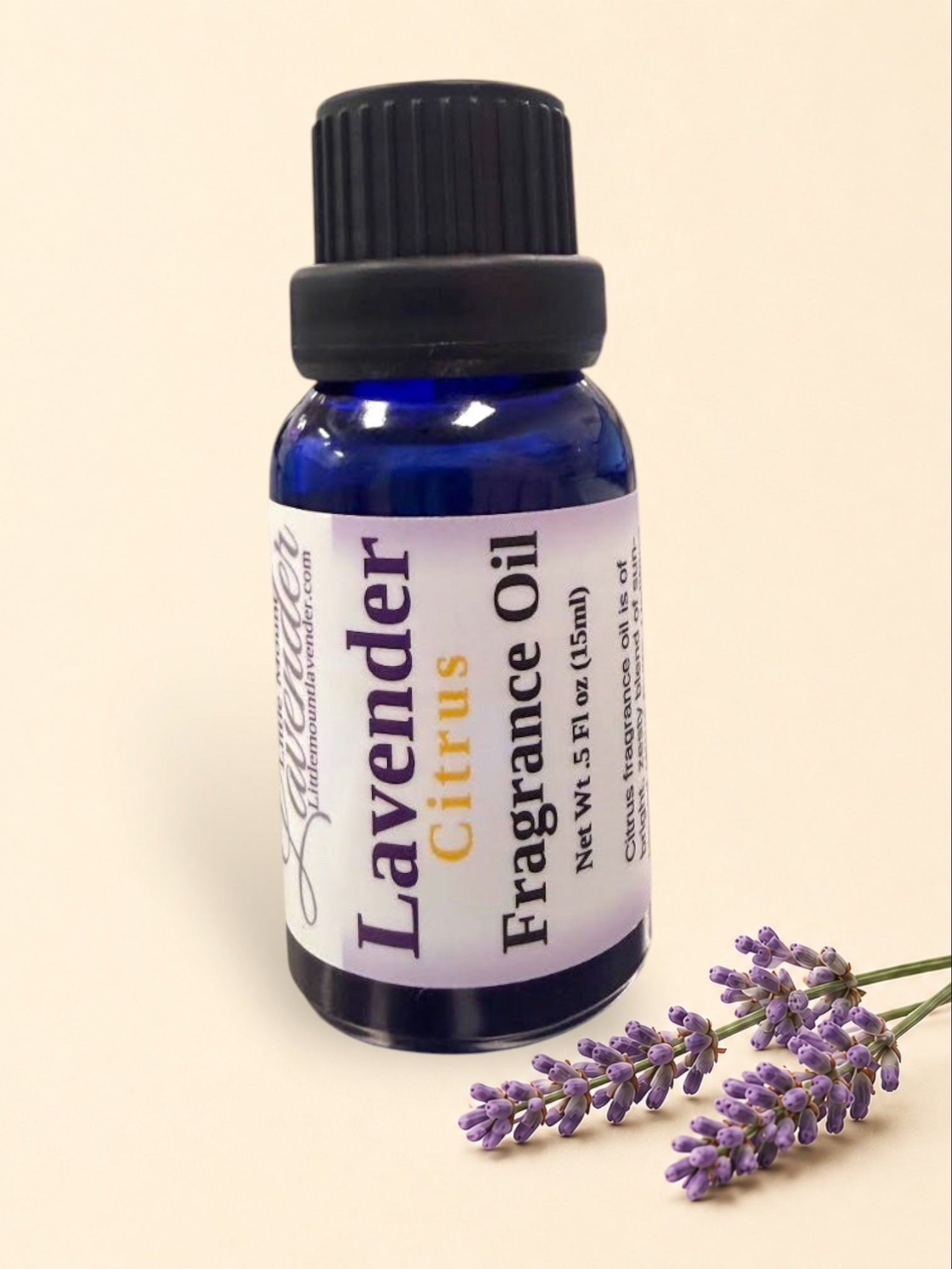 Little Mount Lavender Citrus fragrance oil in a 15ml cobalt blue glass bottle with a black dropper cap.