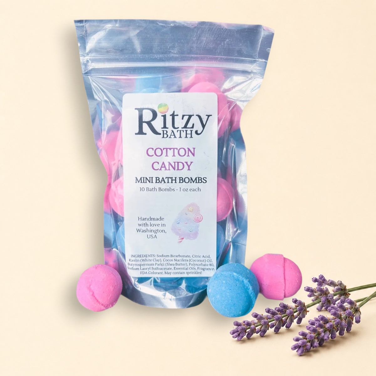 Little Mount Lavender Ritzy Bath cotton candy mini bath bombs in a clear pouch with pink and blue spheres.