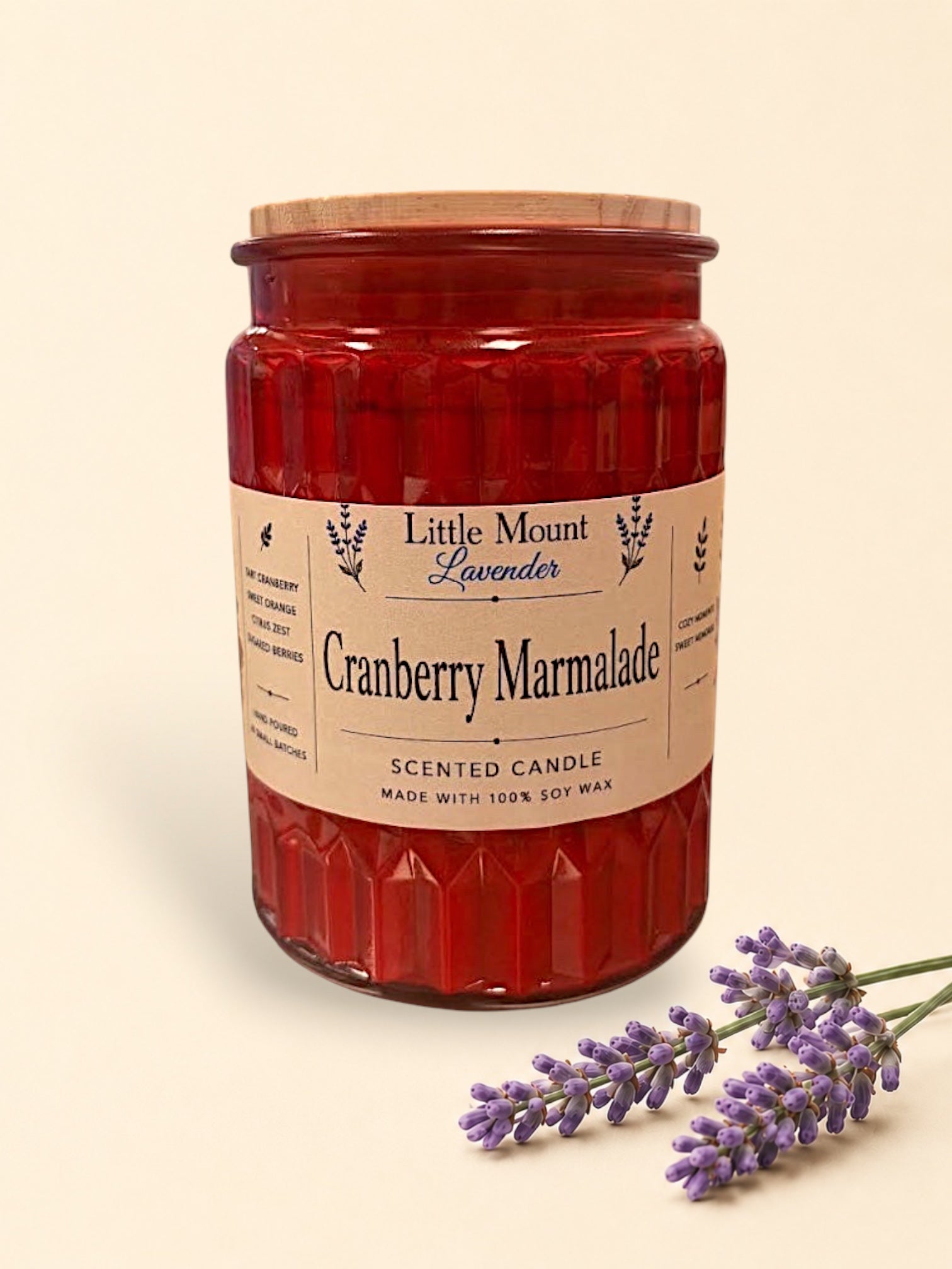Little Mount Lavender Cranberry Marmalade soy wax candle in a red textured glass jar with a wooden lid.