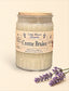 Little Mount Lavender Creme Brulee scented soy wax candle in a textured glass jar with a wooden lid and lavender sprig