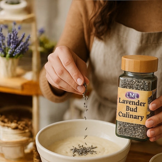 Person sprinkling Little Mount Lavender culinary lavender buds into a bowl for cooking in a rustic kitchen setting.