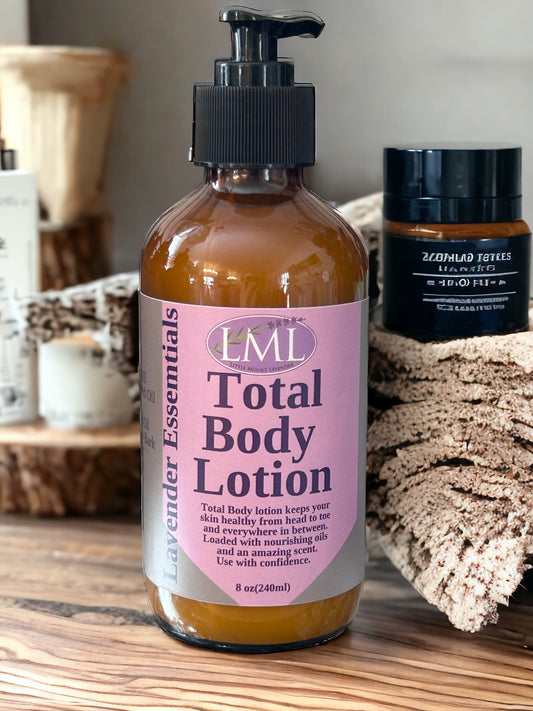 Little Mount Lavender Total Body goat milk lotion in an amber pump bottle with a lavender-colored label.
