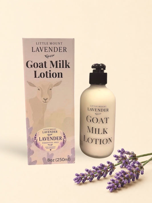 Little Mount Lavender goat milk lotion bottle and box with a goat illustration and lavender floral accents.
