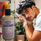 Little Mount Lavender goat milk shampoo bottle next to a man with curly hair washing his hair with rich lather.