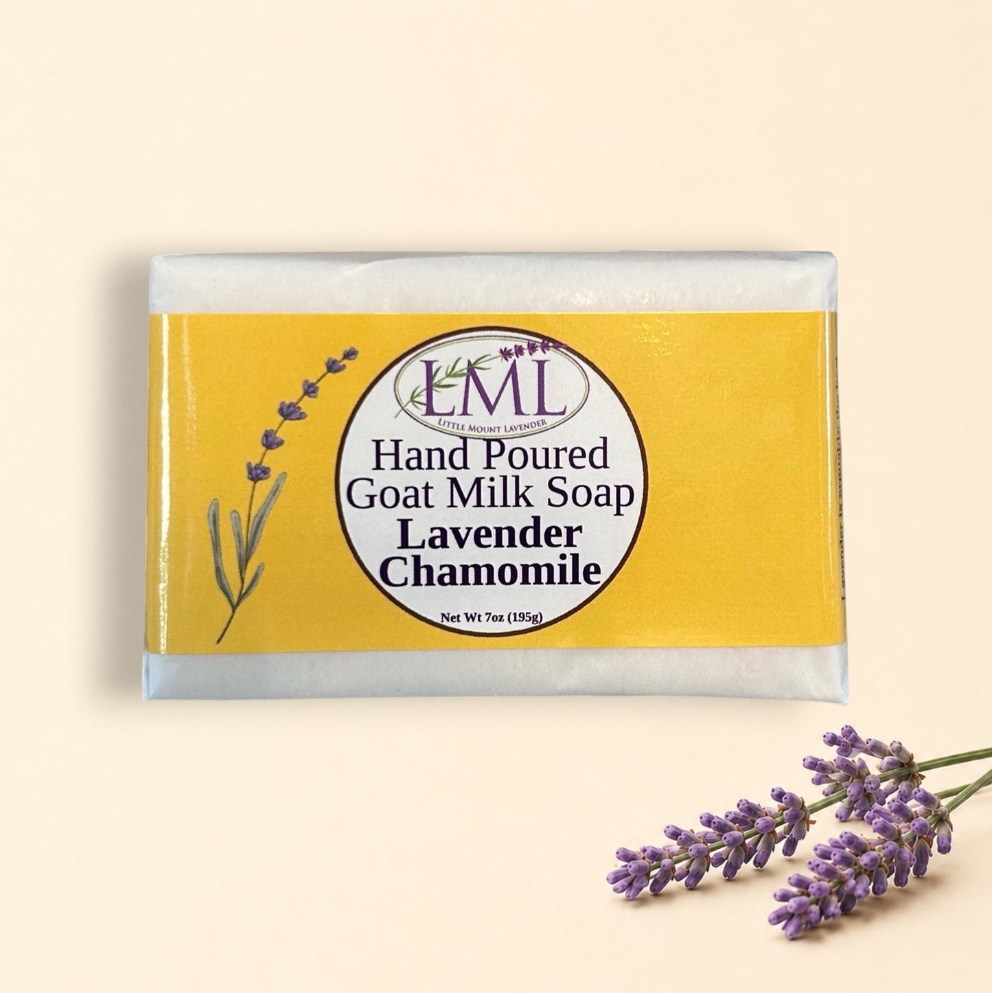 Little Mount Lavender handcrafted goat milk soap with calming lavender and chamomile scent on a rustic wooden surface.