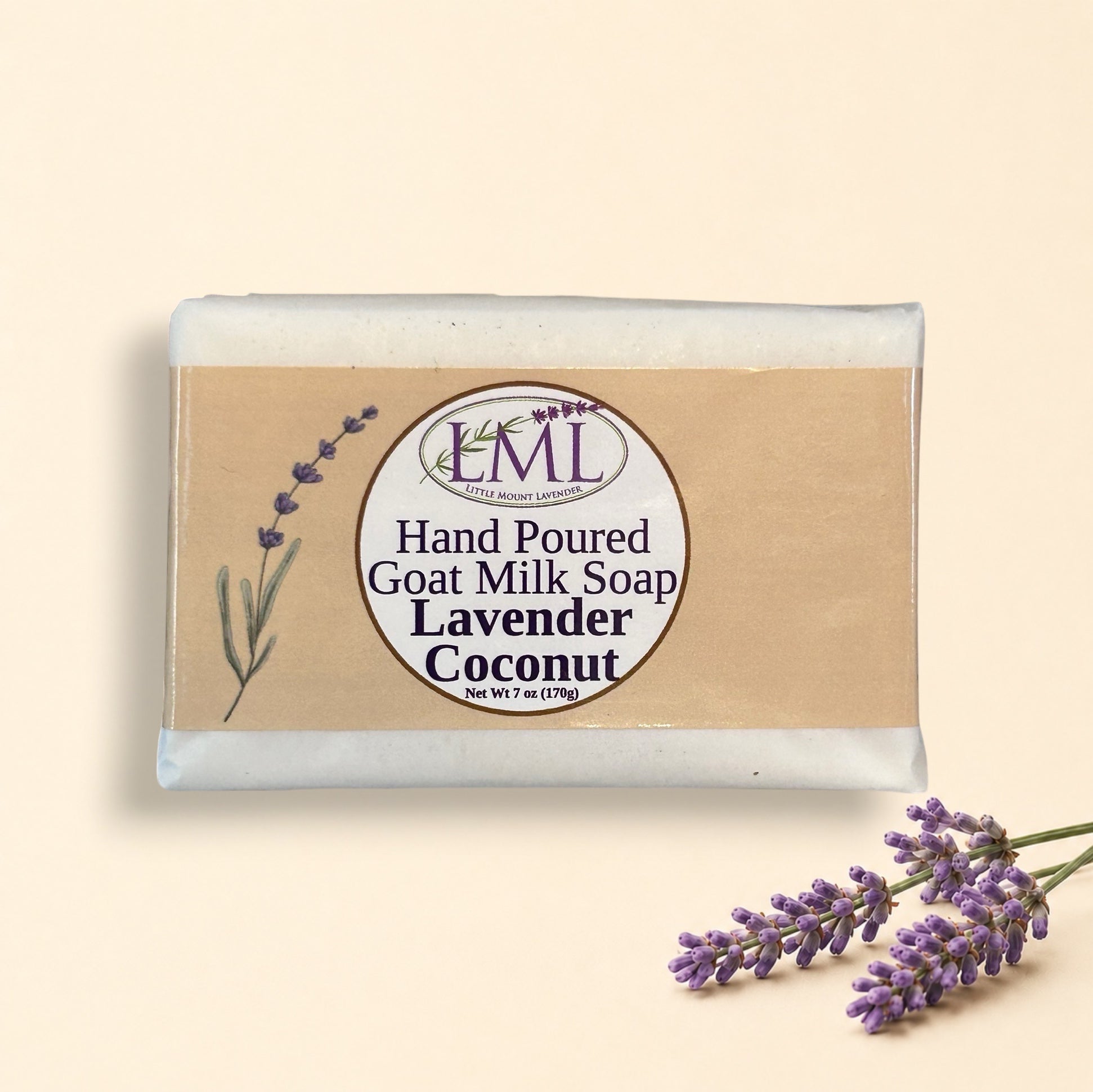 Little Mount Lavender handcrafted goat milk soap with lavender and coconut scent on a sunny tropical beach.