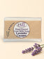 Little Mount Lavender handcrafted goat milk soap with lavender and coconut scent on a sunny tropical beach.