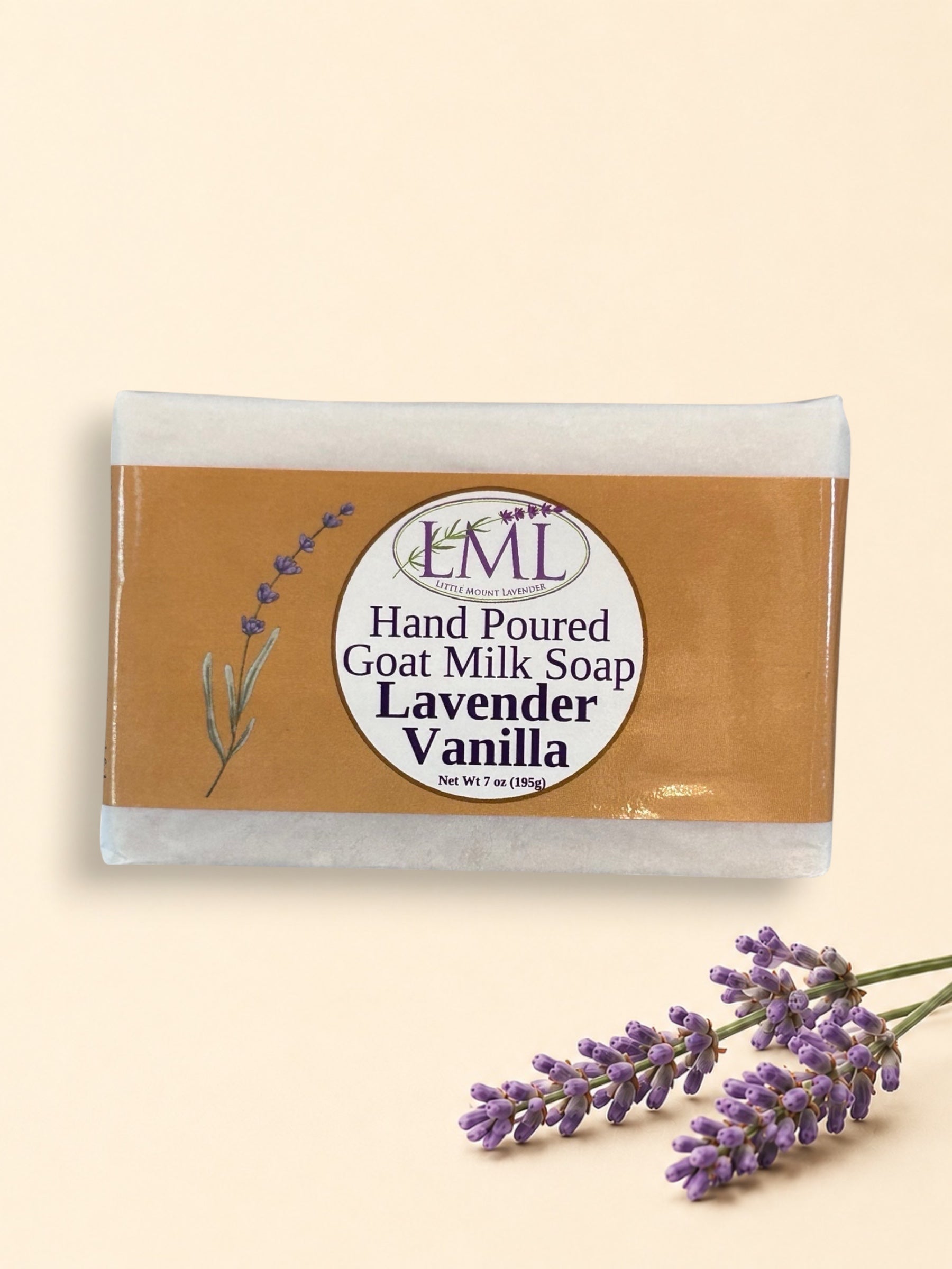 Little Mount Lavender handcrafted goat milk soap bar with lavender and vanilla scent, displayed with dried lavender.