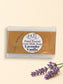 Little Mount Lavender handcrafted goat milk soap bar with lavender and vanilla scent, displayed with dried lavender.