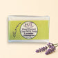 Little Mount Lavender handcrafted goat milk soap bar with lemongrass and lavender scent on a rustic wooden surface.