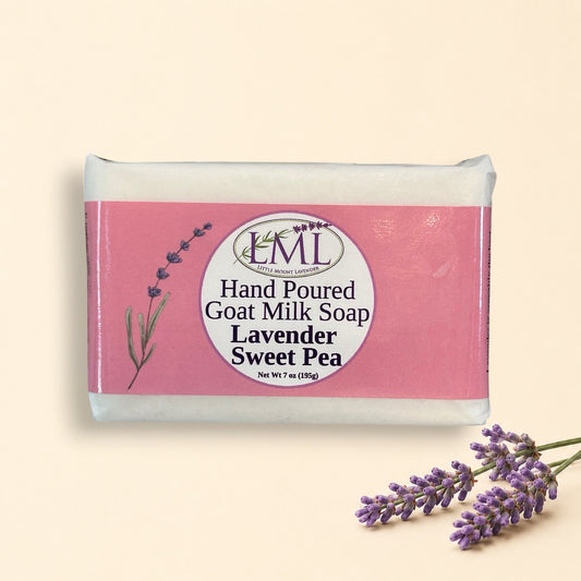 Little Mount Lavender handcrafted goat milk soap bar with lavender and sweet pea scent on a marble surface.