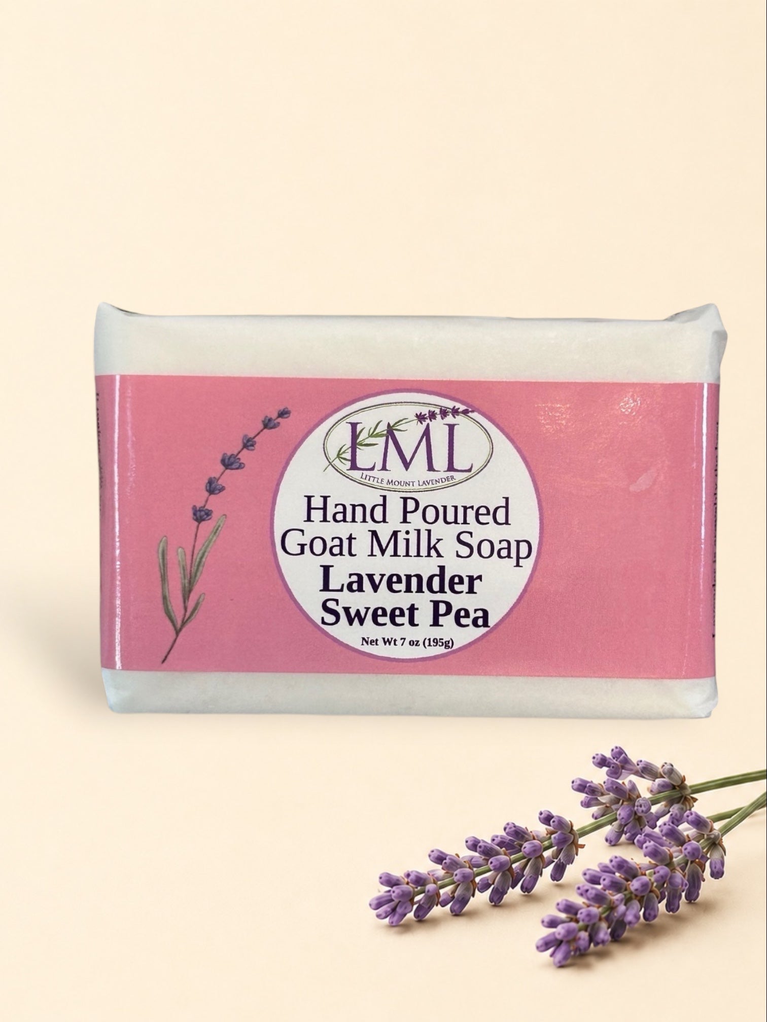 Little Mount Lavender handcrafted goat milk soap bar with lavender and sweet pea scent on a marble surface.