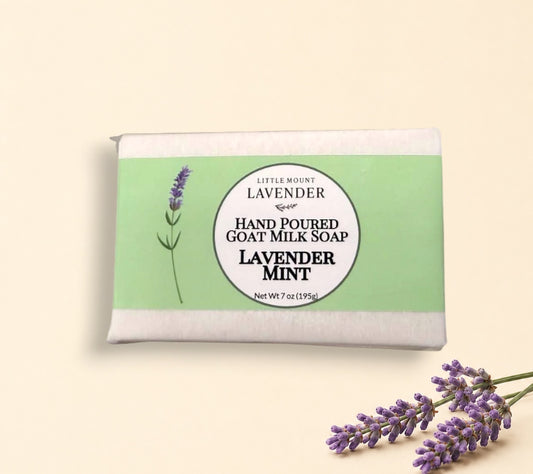 Little Mount Lavender hand poured goat milk soap bar in lavender mint scent with a light green botanical label.