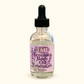 Lavender aromatic body oil in a clear glass dropper bottle with a purple label.