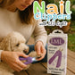 Little Mount Lavender purple LED pet nail clippers being used by a woman to trim a small dog's nails outdoors.