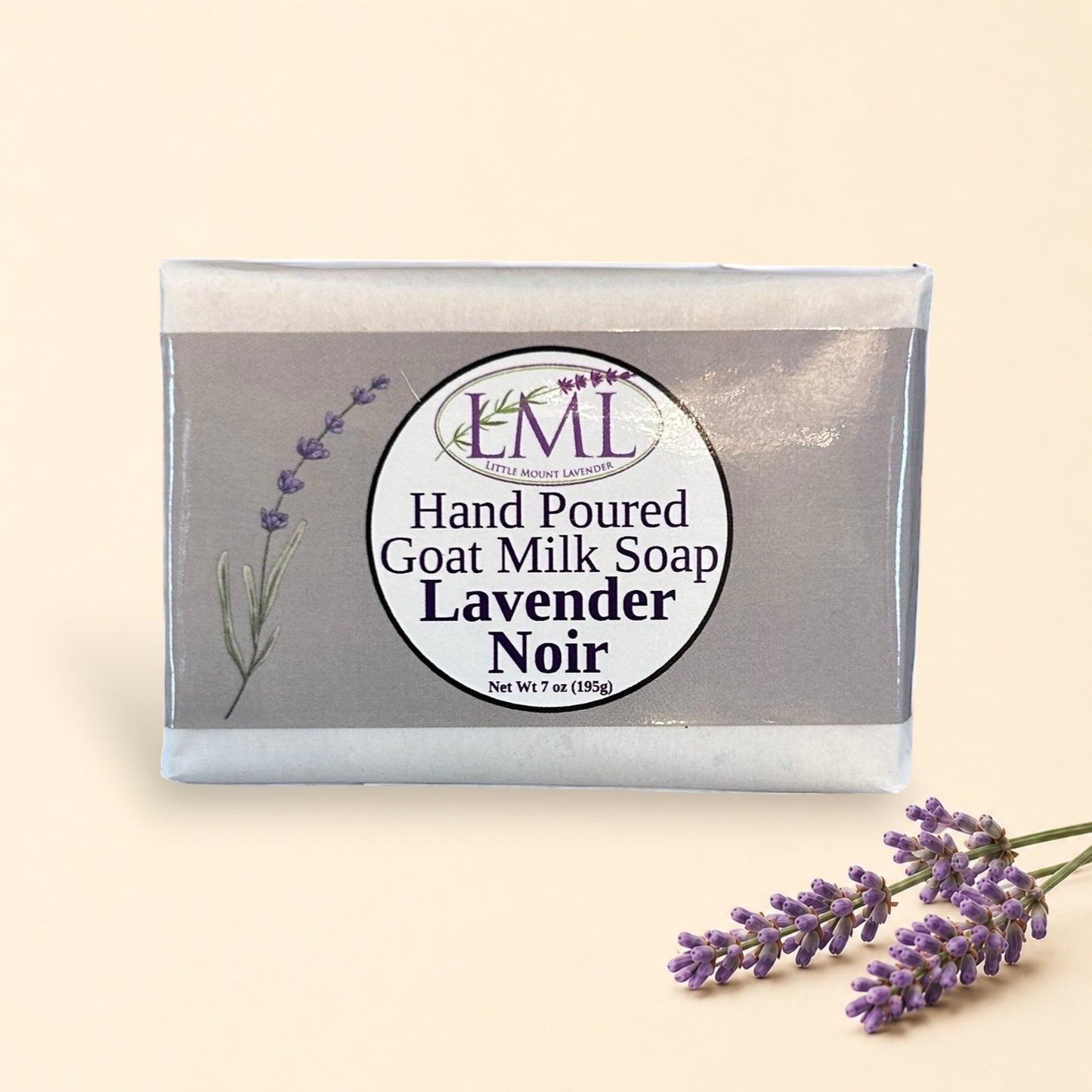 Little Mount Lavender Noir goat milk soap bar with lavender scent, handcrafted and wrapped in elegant packaging.