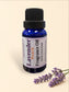 Little Mount Lavender Peach fragrance oil in a 15ml cobalt blue glass bottle with a black cap on a metal surface.
