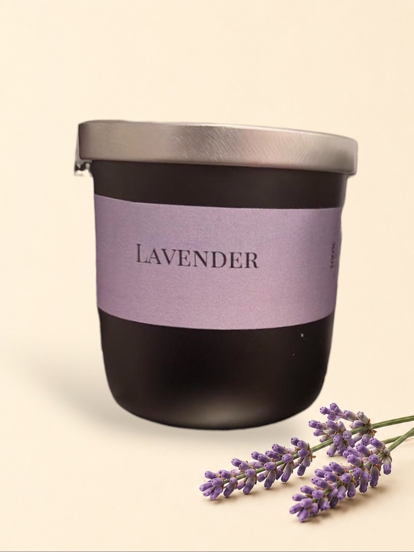 Little Mount Lavender scented candles in matte black and white jars with brushed silver lids and lavender labels