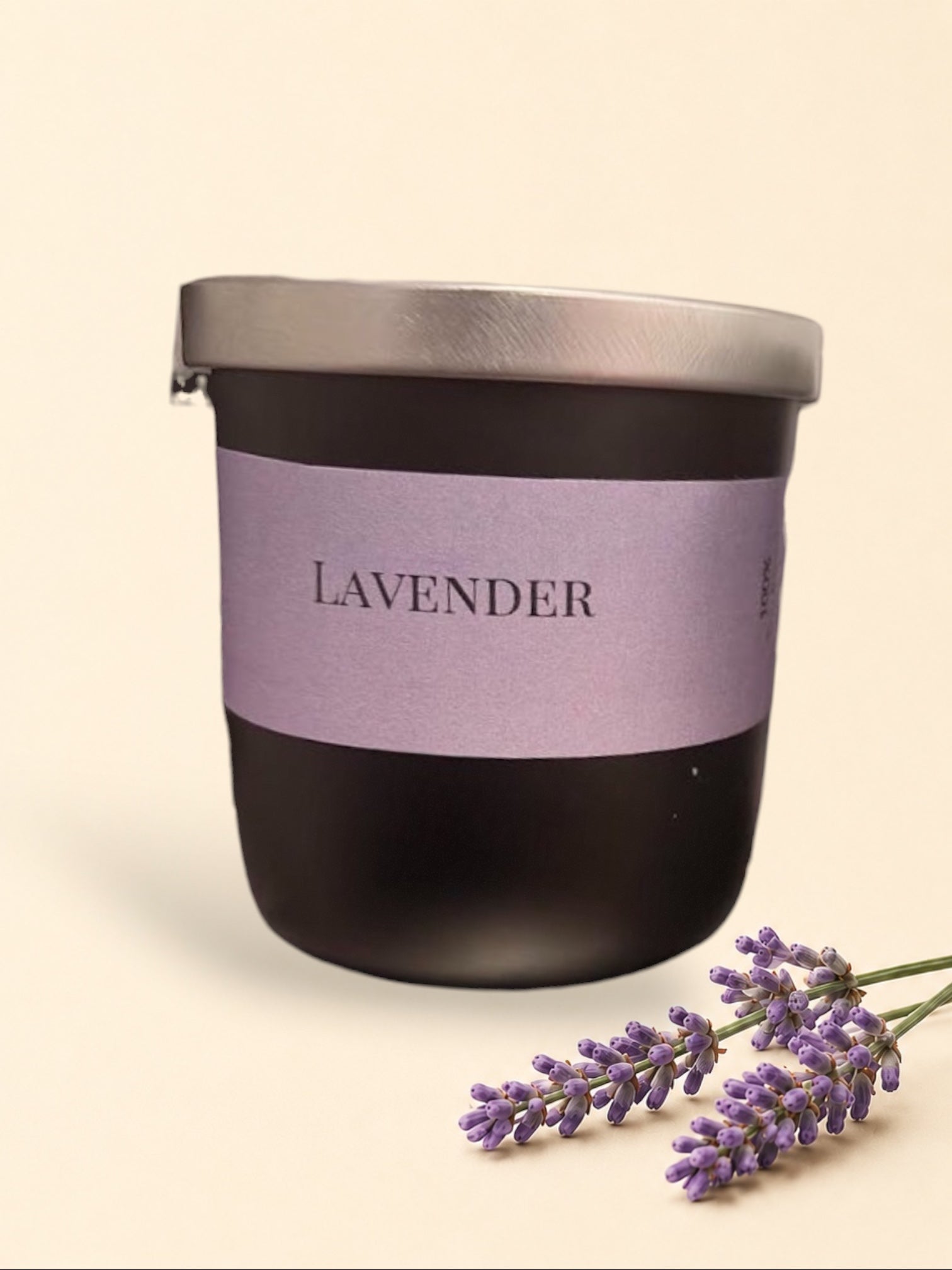 Little Mount Lavender scented candles in matte black and white jars with brushed silver lids and lavender labels