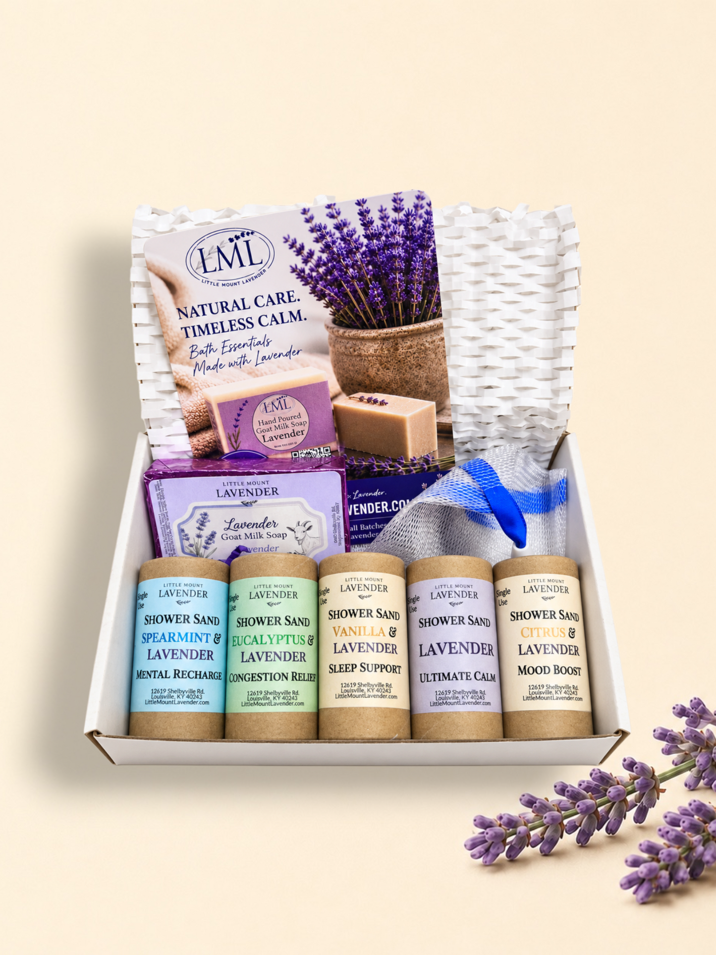 Shower Sand sampler box with five scent tubes, lavender soap and a mesh bag.