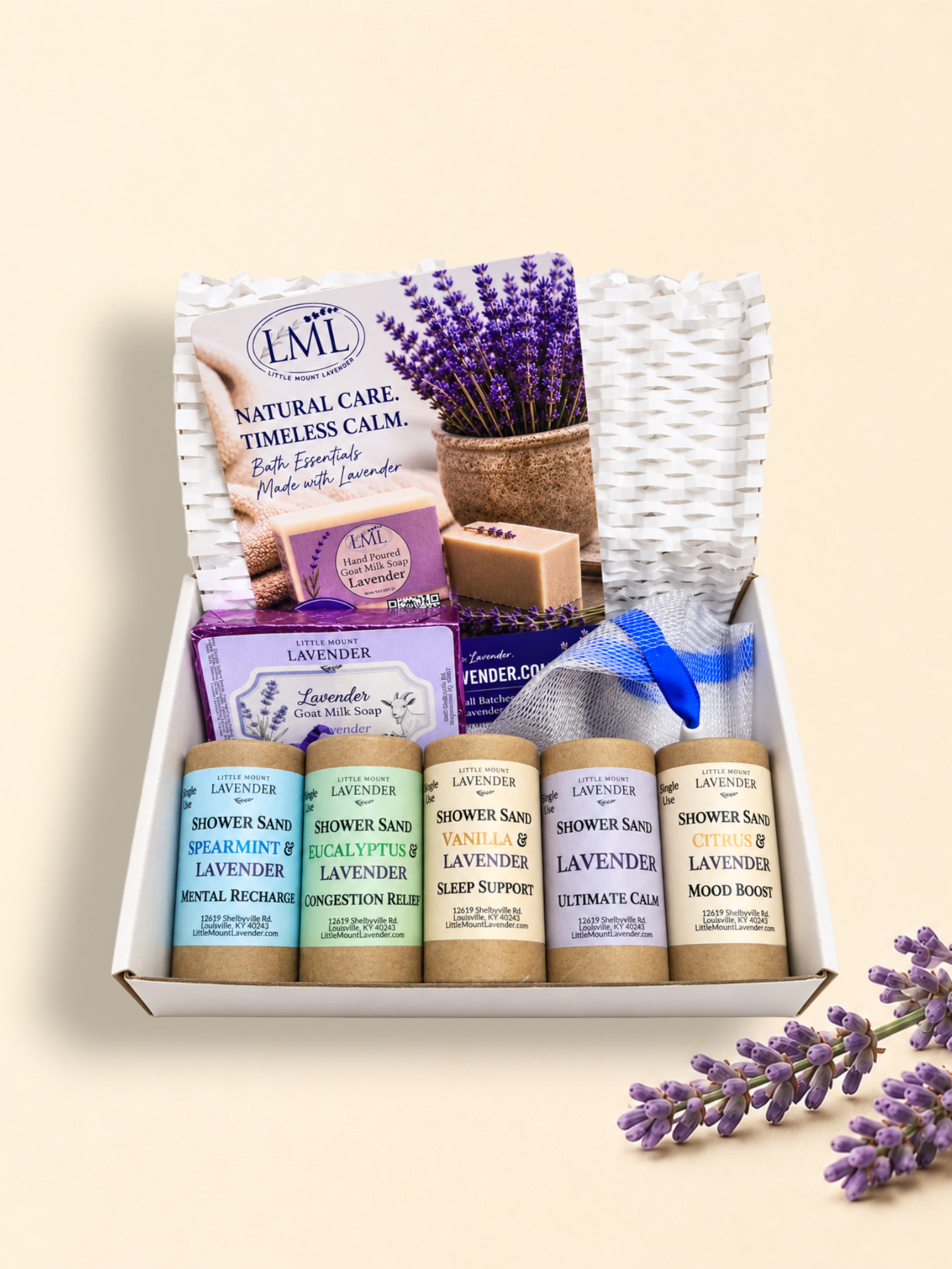 Shower Sand sampler box with five scent tubes, lavender soap and a mesh bag.