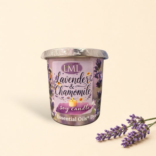 Little Mount Lavender soy candle in a decorative glass jar with lavender floral print on a rustic wooden table.