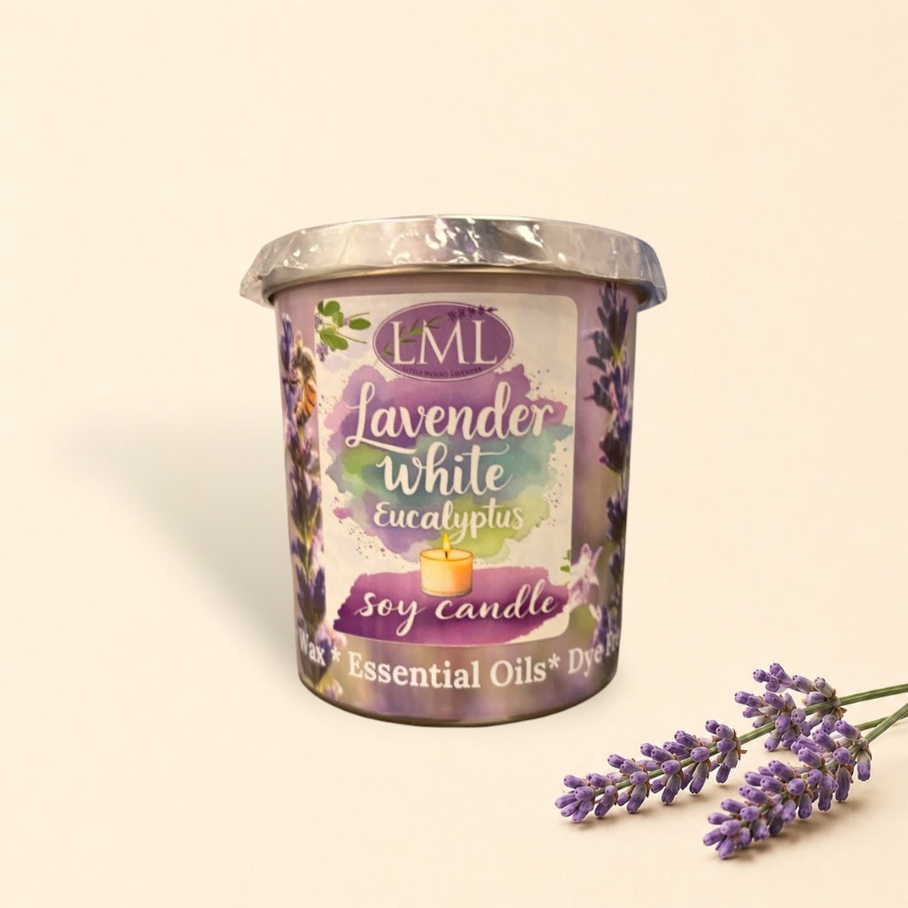 Little Mount Lavender soy candle in a purple glass jar with eucalyptus and lavender scent on a wooden surface.