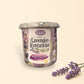 Little Mount Lavender 10 oz soy candle with spicy vanilla tobacco scent in a reusable glass jar on a wooden coaster.