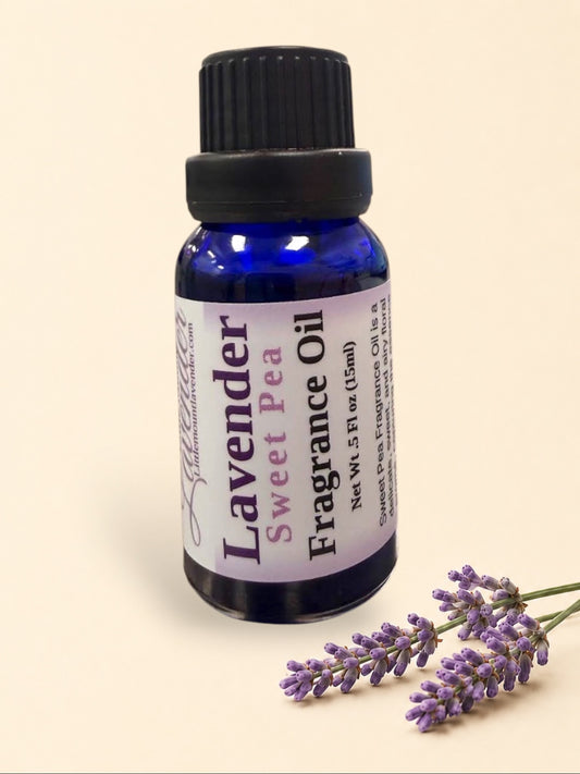 Little Mount Lavender Sweet Pea fragrance oil in a 15ml cobalt blue glass bottle with a black screw cap.