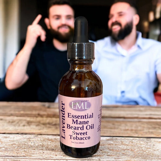 Little Mount Lavender Sweet Tobacco beard oil in a glass dropper bottle with two bearded men in the background.