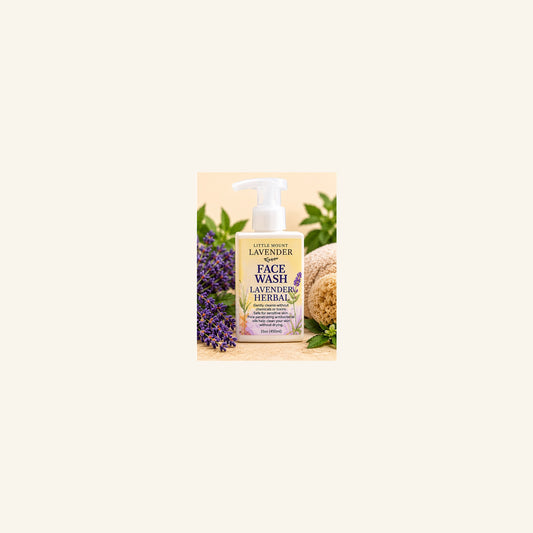 Lavender Herbal Face Wash 15 oz square bottle with white foaming pump on cream background